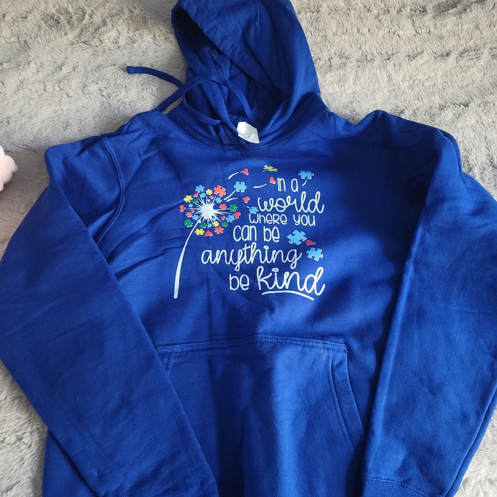 In A World Where You Can Be Anything Be Kind royal blue hoodie